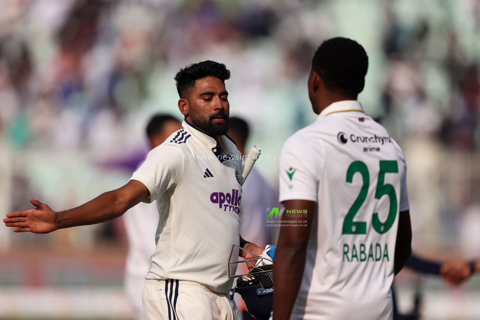 Mohammed Siraj of India with Kagiso Rabada of South Africa during the IDFC First Bank Test Day 3 match India vs South Africa at Eden Gardens, Kolkata, India, 16th November 2025

(Photo by Shubhajit Roy Karmakar/News Images)