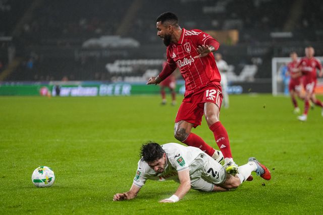 Douglas Luiz of Nottingham Forest  and Josh Key of Swansea City dual for the ball during the Carabao Cup 3rd Round Swansea City vs Nottingham Forest at Swansea.com Stadium, Swansea, United Kingdom, 17th September 2025

(Photo by Andrew Lewis/News Images)