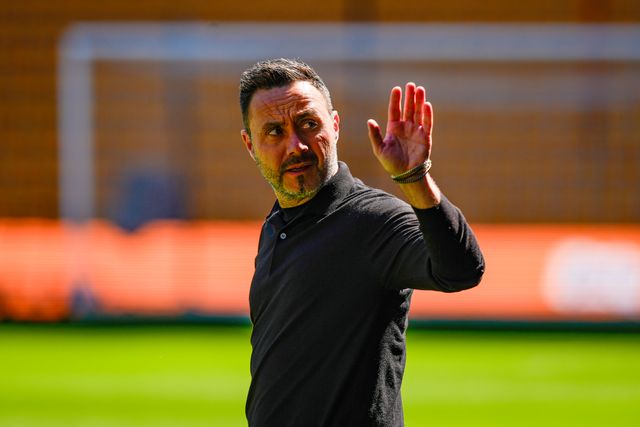 Roberto De Zerbi manager of Tottenham Hotspur waves at a fan  inspects the pitch prior to kick off during the Premier League match Wolverhampton Wanderers vs Tottenham Hotspur at Molineux, Wolverhampton, United Kingdom on 25 April 2026

(Photo by Maynard Manyowa/News Images)