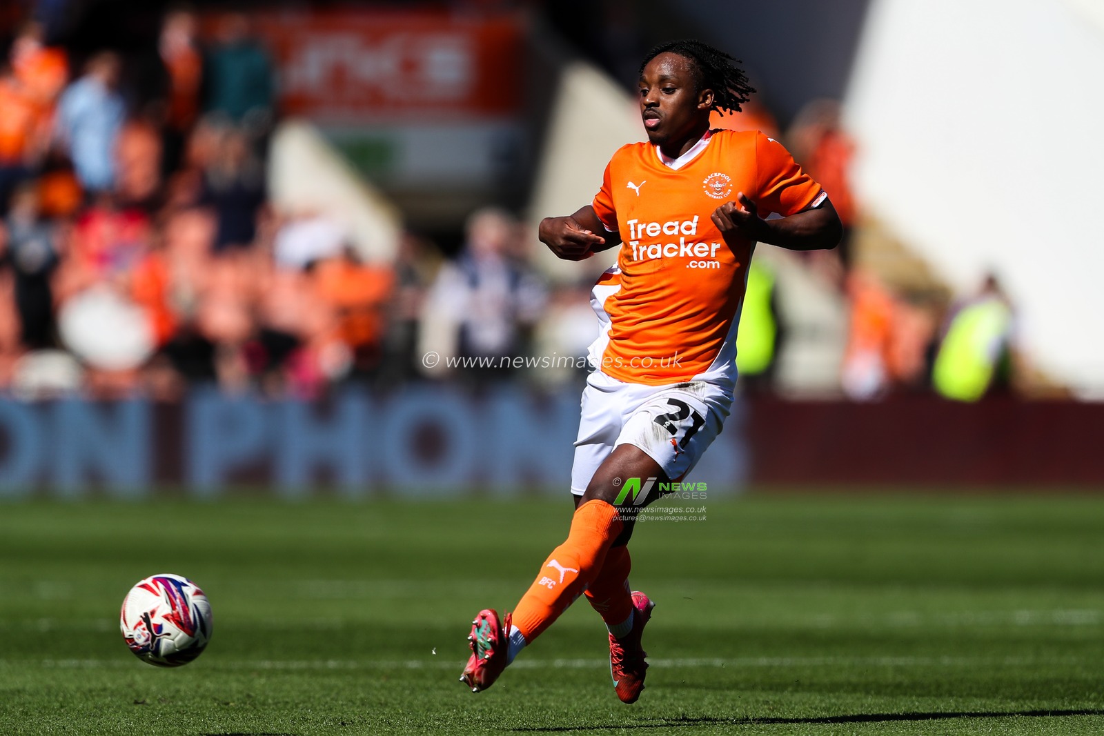 Niall Ennis of Blackpool passes the ball during the Sky Bet League 1 match Blackpool vs Bristol Rovers at Bloomfield Road, Blackpool, United Kingdom, 3rd May 2025

(Photo by Gareth Evans/News Images)