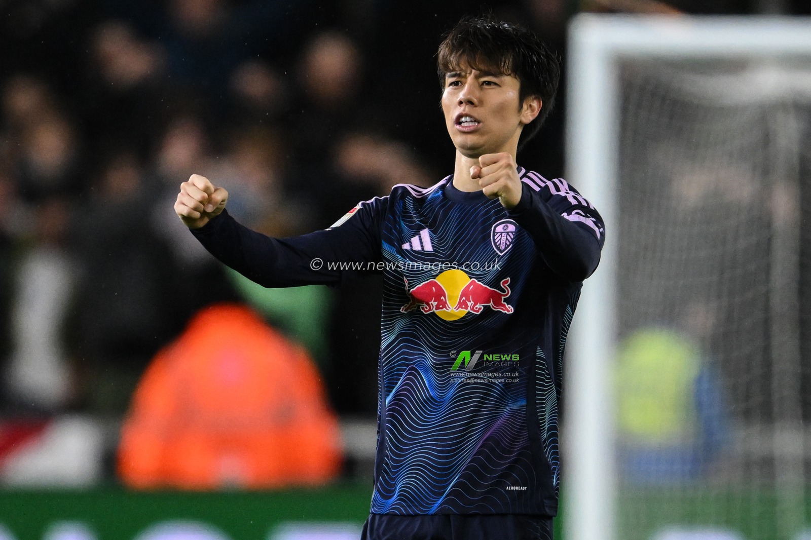 Ao Tanaka of Leeds United celebrates his teams win after the Sky Bet Championship match Swansea City vs Leeds United at Swansea.com Stadium, Swansea, United Kingdom, 24th November 2024

(Photo by Craig Thomas/News Images)