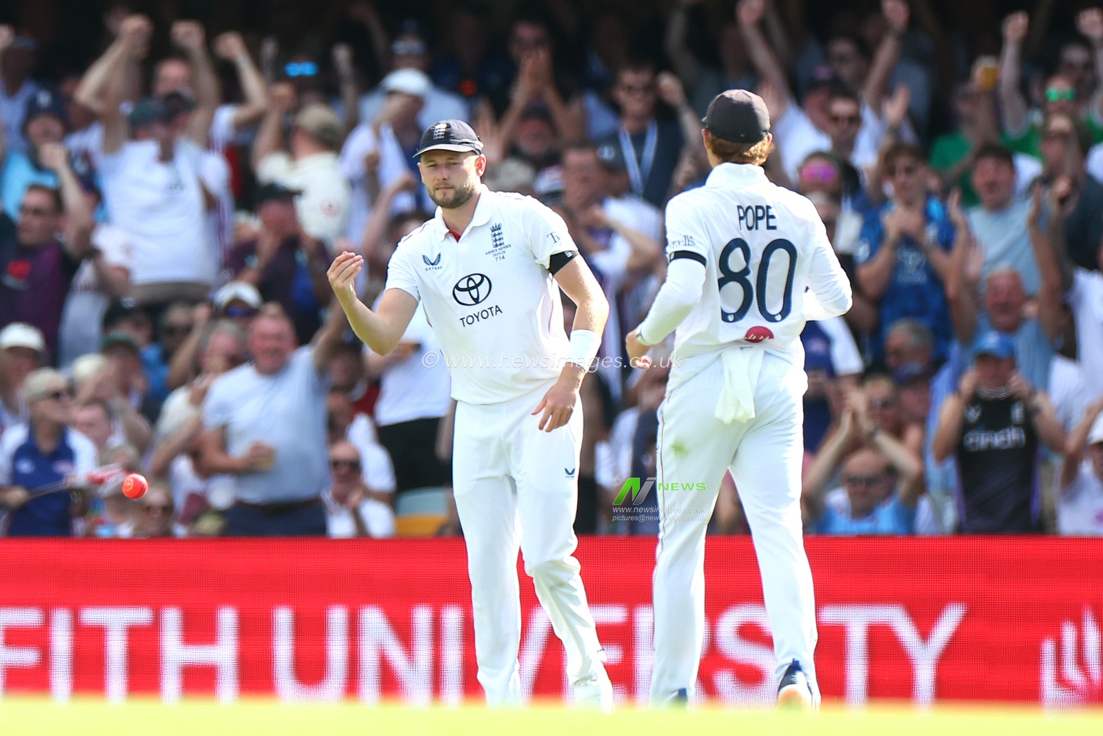 Gus Atkinson of England  celebrates the dismissal of Travis Head of Australia during the NRMA Insurance Ashes Second Test Day 2 Australia vs England at The Gabba, Brisbane Cricket Ground, Brisbane, Australia, 5th December 2025

(Photo by Pat Hoelscher/News Images)

*** GER AUT SUI OUT ***