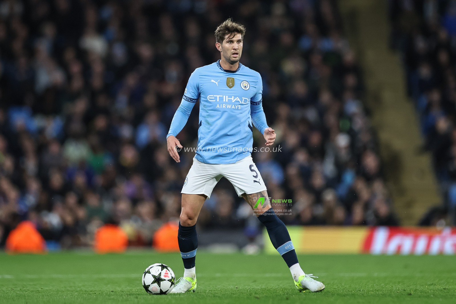 John Stones of Manchester City holds the ball during the UEFA Champions League, League Stage Manchester City v Sparta Prague at Etihad Stadium, Manchester, United Kingdom, 23rd October 2024

(Photo by Mark Cosgrove/News Images)