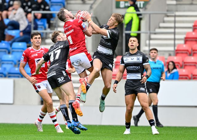 Ryan Brierley of Salford Red Devils and Logan Moy Hull FC  both jump to catch the ball during the Betfred Super League Round 16 match Salford Red Devils vs Hull FC at Salford Community Stadium, Eccles, United Kingdom, 7th July 2024

(Photo by Cody Froggatt/News Images)