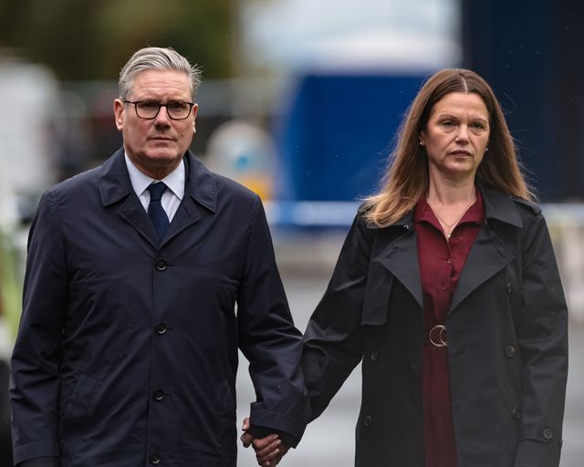 Sir Keir Starmer, Prime Minister of the United Kingdom of Great Britain and Northern Ireland and his wife Victoria, Lady Starmer hold hands as they leave the scene during the Manchester synagogue terror attack day 2 at Heaton Park Shul, Manchester, United Kingdom, 3rd October 2025

(Photo by Mark Cosgrove/News Images)