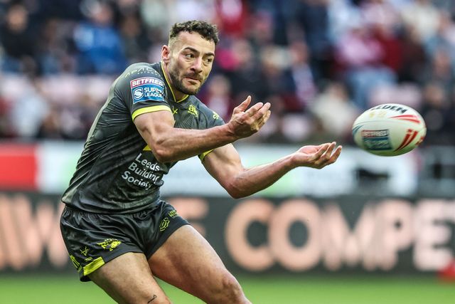 Jake Connor of Leeds Rhinos passes the ball during the Betfred Super League round 11 match Wigan Warriors vs Leeds Rhinos at The Brick Community Stadium, Wigan, United Kingdom on 15 May 2026

(Photo by Alfie Cosgrove/News Images)