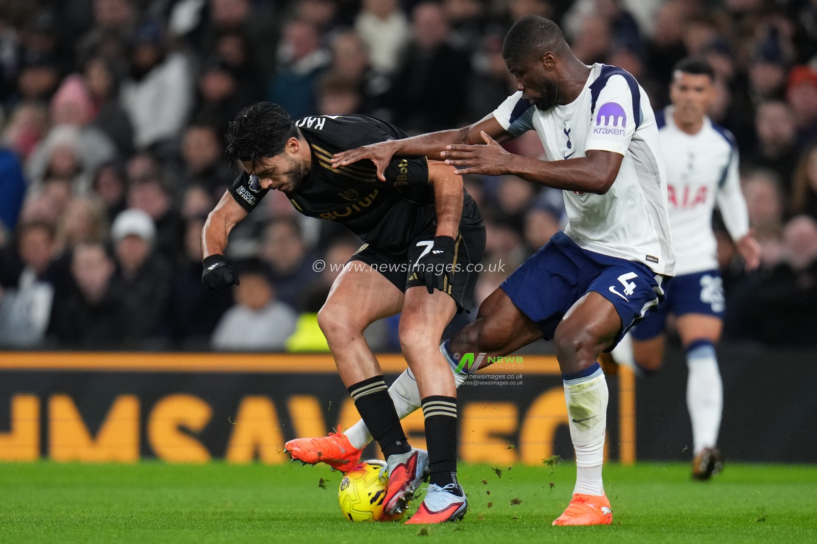 Kevin Danso of Tottenham Hotspur tries to tackle Raul Jimenez of Fulham during the Premier League match Tottenham Hotspur vs Fulham at Tottenham Hotspur Stadium, London, United Kingdom, 29th November 2025

(Photo by Harvey Murphy/News Images)

*** GER AUT SUI OUT ***