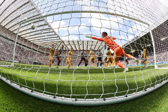Dan Burn of Newcastle United scores past Brighton & Hove Albion goalkeeper Bart Verbruggen to make it 2-0 during the Premier League match Newcastle Untied vs Brighton & Hove Albion at St. James's Park, Newcastle, United Kingdom on 02 May 2026

(Photo by Mark Cosgrove/News Images)