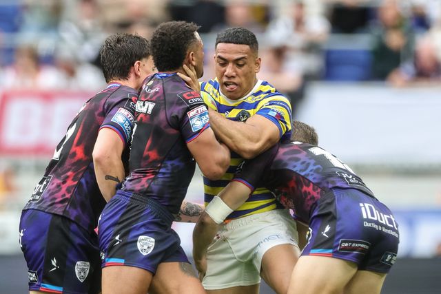 Albert Hopoate of Warrington Wolves is tackled by Umyla Hanley of Leigh Leopards during the Betfred Super League Magic Weekend match Leigh Leopards vs Warrington Wolves at Hill Dickinson Stadium, Liverpool, United Kingdom on 04 July 2026

(Photo by Mark Cosgrove/News Images)