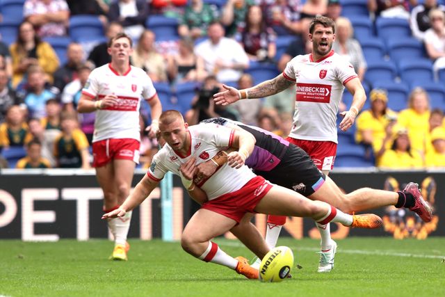 Mikey Lewis of Hull KR is tackled by Jed Cartwright of Hull FC during the Betfred Super League Magic Weekend match Hull KR vs Hull FC at Hill Dickinson Stadium, Liverpool, United Kingdom on 04 July 2026

(Photo by Alfie Cosgrove/News Images)