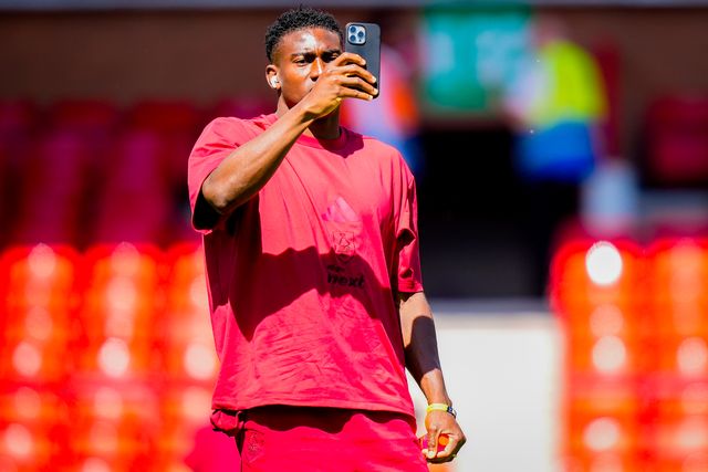Taiwo Awoniyi of Nottingham Forest on his mobile phone as he inspects the pitch prior to kick off during the Premier League match Nottingham Forest vs Bournemouth at City Ground, Nottingham, United Kingdom on 24 May 2026

(Photo by Maynard Manyowa/News Images)