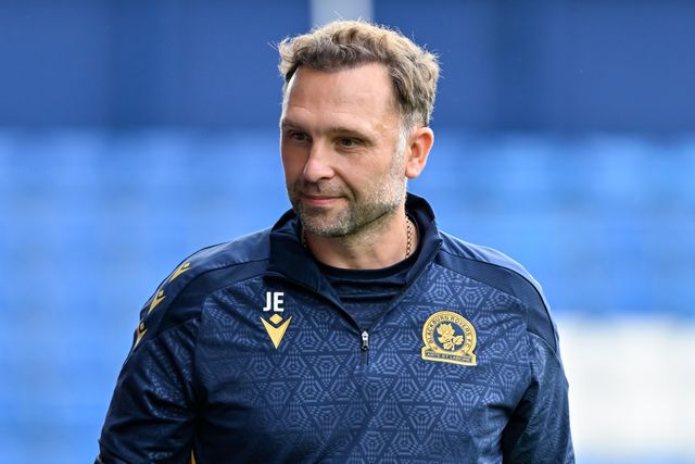 John Eustace manager of Blackburn Rovers walks towards the bench ahead of kick off during the Pre-season friendly match Stockport County vs Blackburn Rovers at Edgeley Park Stadium, Stockport, United Kingdom, 2nd August 2024

(Photo by Cody Froggatt/News Images)