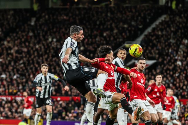 Fabian Schar of Newcastle United takes a shot on goal from a corner during the Premier League match Manchester United vs Newcastle United at Old Trafford, Manchester, United Kingdom, 26th December 2025

(Photo by Alfie Cosgrove/News Images)

*** GER AUT SUI OUT ***