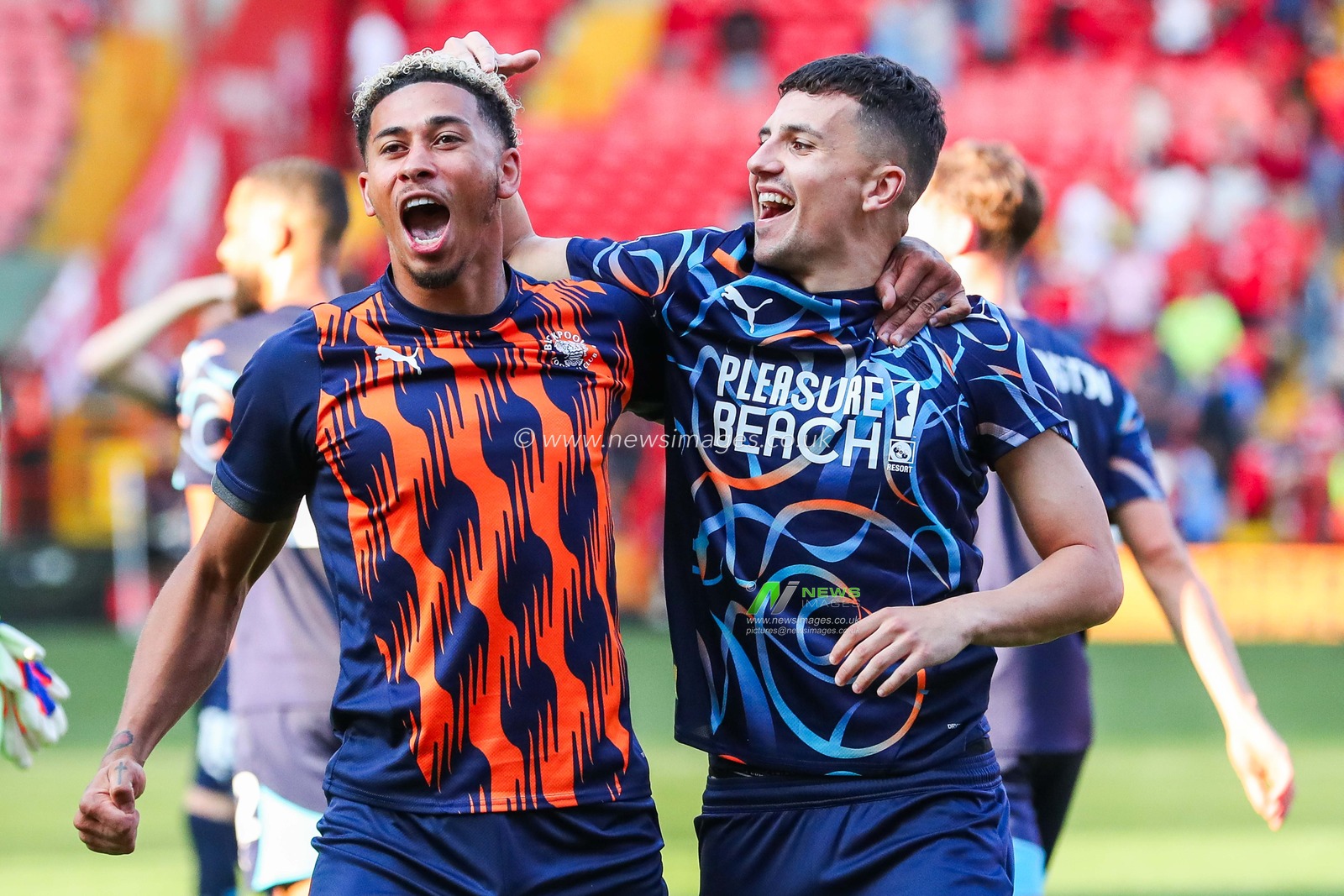 Jordan Lawrence-Gabriel and Albie Morgan of Blackpool celebrate after the teams victory following the Sky Bet League 1 match Charlton Athletic vs Blackpool at The Valley, London, United Kingdom, 21st September 2024

(Photo by Izzy Poles/News Images)