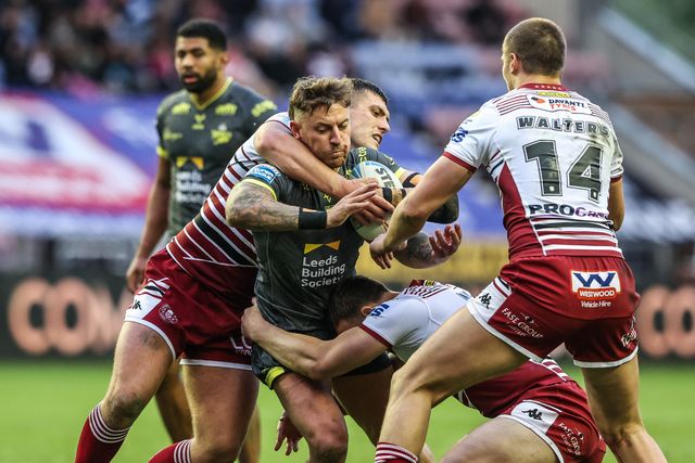 Chris Hankinson of Leeds Rhinos is tackled during the Betfred Super League round 11 match Wigan Warriors vs Leeds Rhinos at The Brick Community Stadium, Wigan, United Kingdom on 15 May 2026

(Photo by Alfie Cosgrove/News Images)