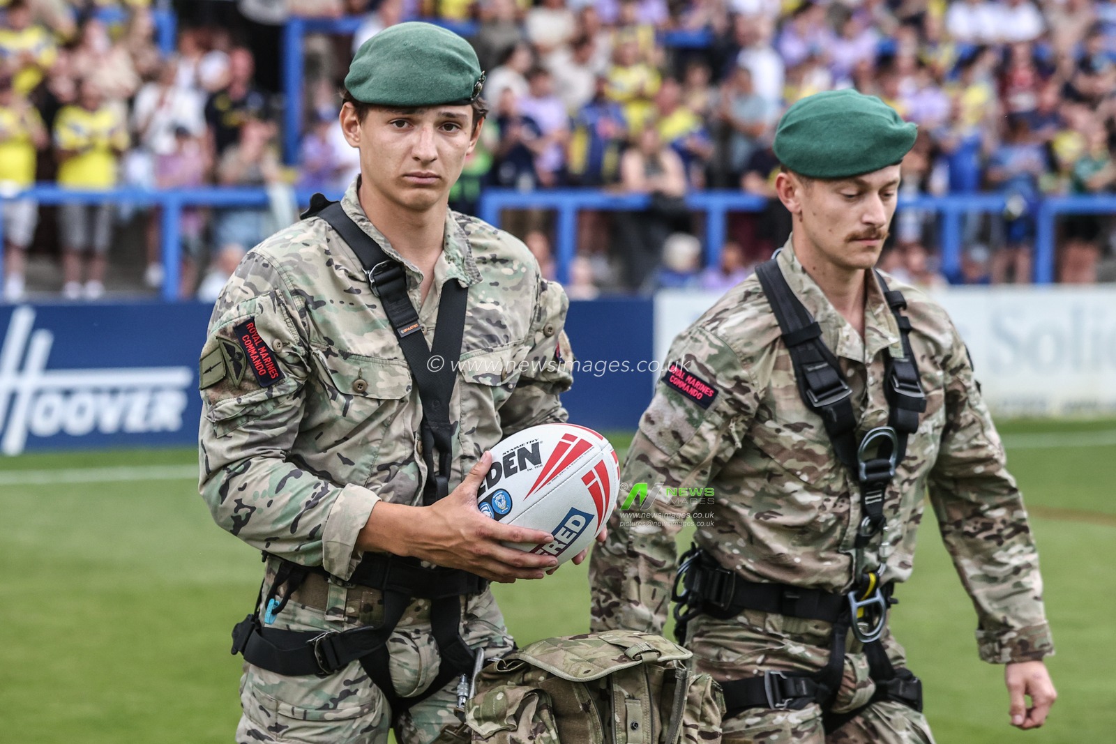 The British Marines deliver the match ball during the Betfred Super League round 15 match Warrington Wolves vs Huddersfield Giants at Halliwell Jones Stadium, Warrington, United Kingdom, 21st June 2025

(Photo by Alfie Cosgrove/News Images)