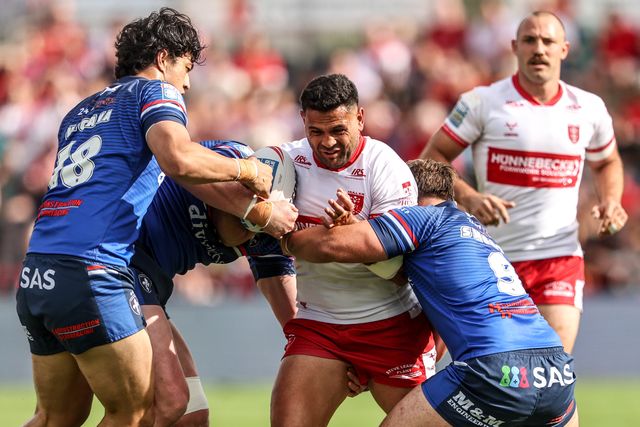 Rhyse Martin of Hull KR is tackled by Tyson Smoothy of Wakefield Trinity and Isaiah Vagana of Wakefield Trinity during the Betfred Super League round 18 match Hull KR vs Wakefield Trinity at Sewell Group Craven Park, Hull, United Kingdom on 11 July 2026

(Photo by Alfie Cosgrove/News Images)