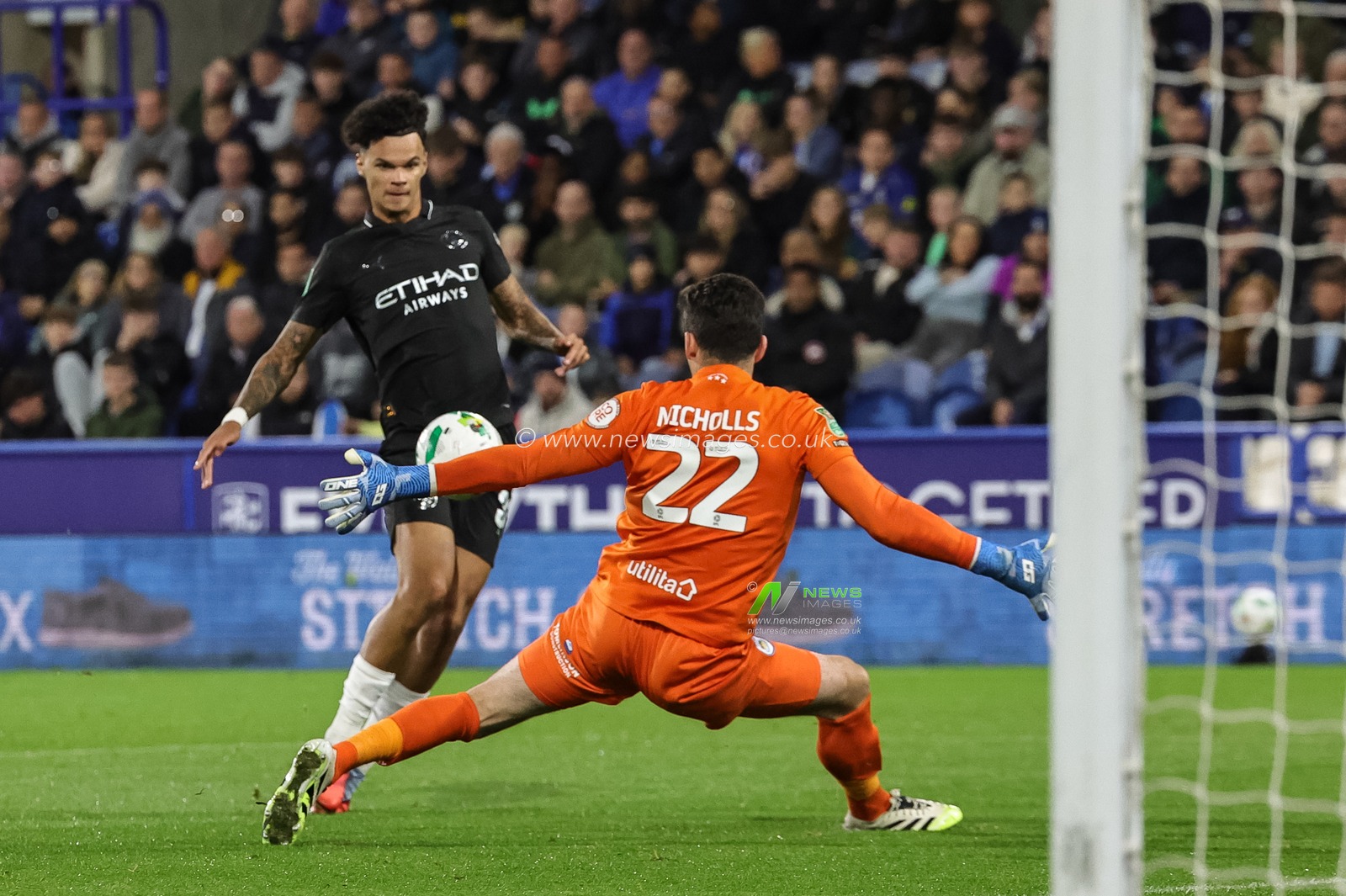 Lee Nicholls of Huddersfield Town saves a shot off Nico O'Reilly of Manchester City during the Carabao Cup Round 3 match Huddersfield Town vs Manchester City at Accu Stadium, Huddersfield, United Kingdom, 24th September 2025

(Photo by Mark Cosgrove/News Images)