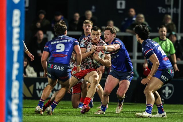 Innes Senior of Leigh Leopards is tackled by Ky Rodwell of Wakefield Trinity during the Betfred Super League round 5 match Wakefield Trinity vs Leigh Leopards at DIY Kitchens Stadium, Wakefield, United Kingdom on 20 March 2026

(Photo by Alfie Cosgrove/News Images)