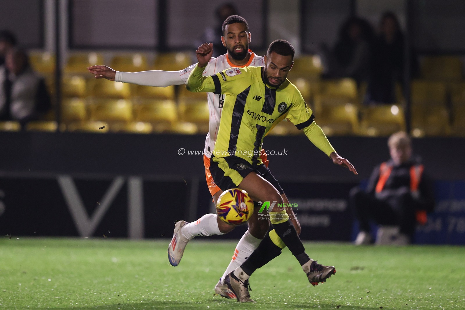 CJ Hamilton of Blackpool and Warren Burrell of Harrogate Town battle for the ball during the Bristol Street Motors Trophy match Harrogate Town vs Blackpool at Wetherby Road, Harrogate, United Kingdom, 12th November 2024

(Photo by Alfie Cosgrove/News Images)
