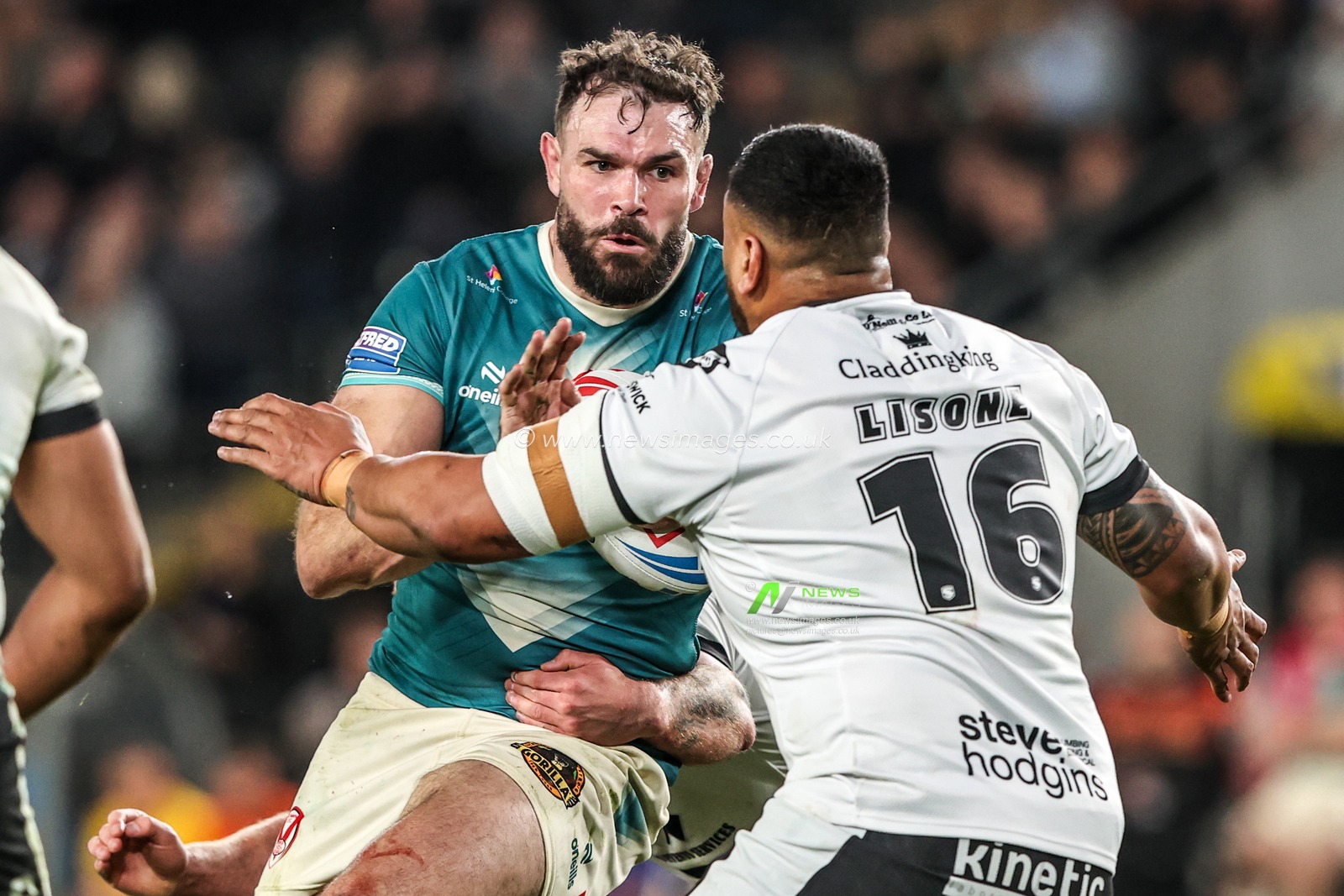Alex Walmsley of St Helens is tackled by James Bell of Hull FC and Sam Lisone of Hull FC during the Betfred Super League round 8 match Hull FC vs St Helens at MKM Stadium, Hull, United Kingdom on 16 April 2026

(Photo by Alfie Cosgrove/News Images)