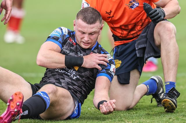 Harry Newman of Leeds Rhinos receives treatment for his injury during the Betfred Super League round 17 match Hull KR vs Leeds Rhinos at Sewell Group Craven Park, Kingston upon Hull, United Kingdom, 6th July 2025

(Photo by Alfie Cosgrove/News Images)