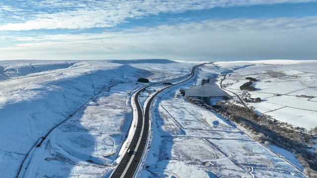 Heavy Snow over the hills of Scammonden Bridge and Booth Wood Reservoir areas of West Yorkshire and a free running M62 where the farm house sits in the middle of the motorway, Kirklees, United Kingdom, 11th January 2025

(Photo by Mark Cosgrove/News Images)
