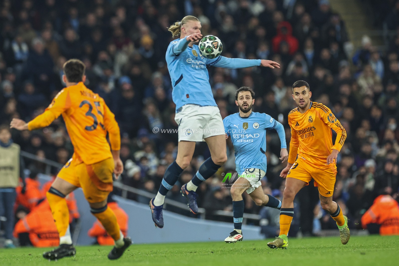 Erling Haaland of Manchester City jumps up to win the high ball during the UEFA Champions League Knockout Round Play-off Manchester City v Real Madrid at Etihad Stadium, Manchester, United Kingdom, 11th February 2025

(Photo by Mark Cosgrove/News Images)