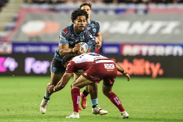 Alec Tuitavake of Leigh Leopards is tackled by Bevan French of Wigan Warriors during the Betfred Super League Semi Final 1 match Wigan Warriors vs Leigh Leopards at The Brick Community Stadium, Wigan, United Kingdom, 3rd October 2025

(Photo by Alfie Cosgrove/News Images)