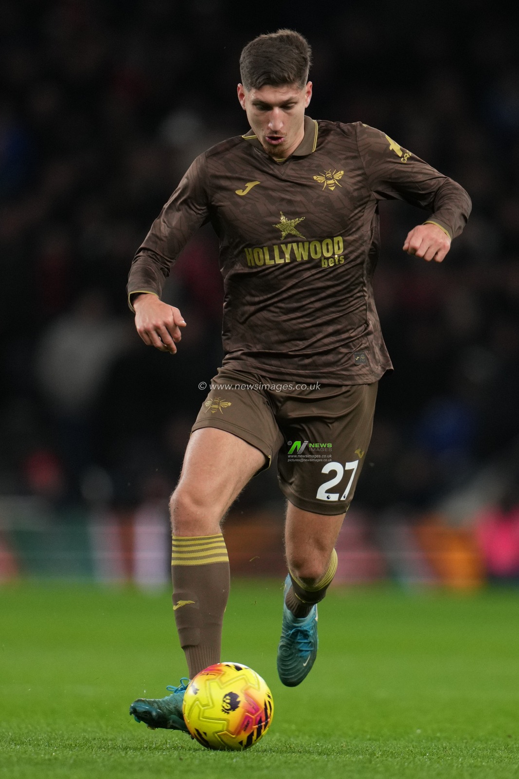 Vitaly Janelt of Brentford on the ball during the Premier League match Tottenham Hotspur vs Brentford at Tottenham Hotspur Stadium, London, United Kingdom, 6th December 2025

(Photo by Harvey Murphy/News Images)

*** GER AUT SUI OUT ***