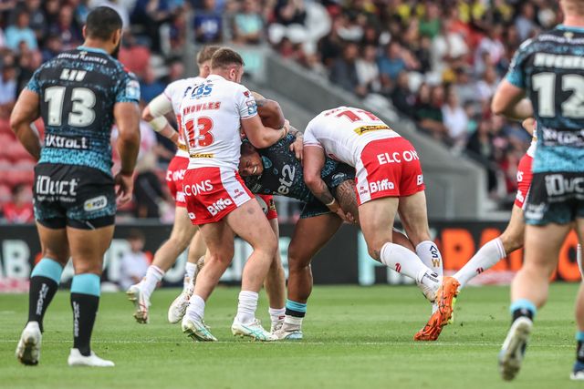 Tesi Niu of Leigh Leopards is tackled by Morgan Knowles of St. Helens and Curtis Sironen of St. Helens during the Betfred Super League round 19 match St Helens vs Leigh Leopards at Totally Wicked Stadium, St Helens, United Kingdom, 17th July 2025

(Photo by Alfie Cosgrove/News Images)