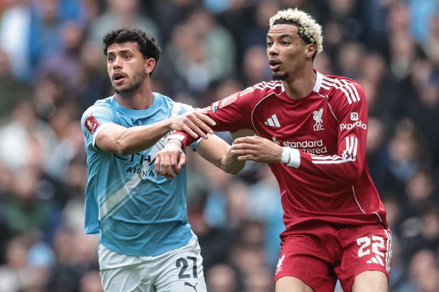 Matheus Nunes of Manchester City andHugo Ekitike of Liverpool battle for the ball during the Emirates FA Cup Quarter-Final match Manchester City vs Liverpool at Etihad Stadium, Manchester, United Kingdom on 04 April 2026

(Photo by Mark Cosgrove/News Images)
