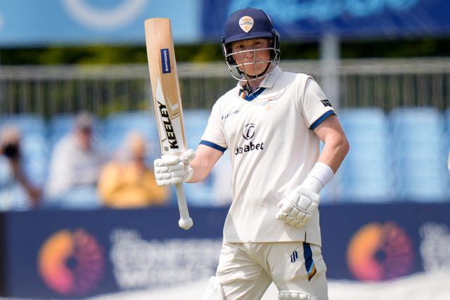 Harry Came of Derbyshire celebrates reaching his 50 by raising his bat to acknowledge the dressing room cheering his half century during the County Championship Division Two Derbyshire vs Northamptonshire day one match at The Central Co-Op County Ground, Derby, United Kingdom on 08 May 2026

(Photo by Maynard Manyowa/News Images)