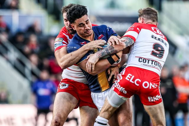 Keenan Palasia of Leeds Rhinos is tackled by Daryl Clark of St Helens during the Betfred Super League round 13 match Leeds Rhinos vs St Helens at AMT Headingley Stadium, Leeds, United Kingdom on 04 June 2026

(Photo by Alfie Cosgrove/News Images)