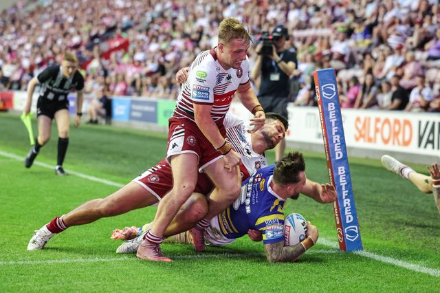 Matty Ashton of Warrington Wolves goes over for a try during the Betfred Super League round 18 match Wigan Warriors vs Warrington Wolves at The Brick Community Stadium, Wigan, United Kingdom on 10 July 2026

(Photo by Mark Cosgrove/News Images)