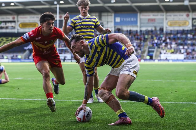 Matty Ashton of Warrington Wolves goes over for a try during the Betfred Super League round 16 match Warrington Wolves vs Catalans Dragons at The Halliwell Jones Stadium, Warrington, United Kingdom on 25 June 2026

(Photo by Alfie Cosgrove/News Images)