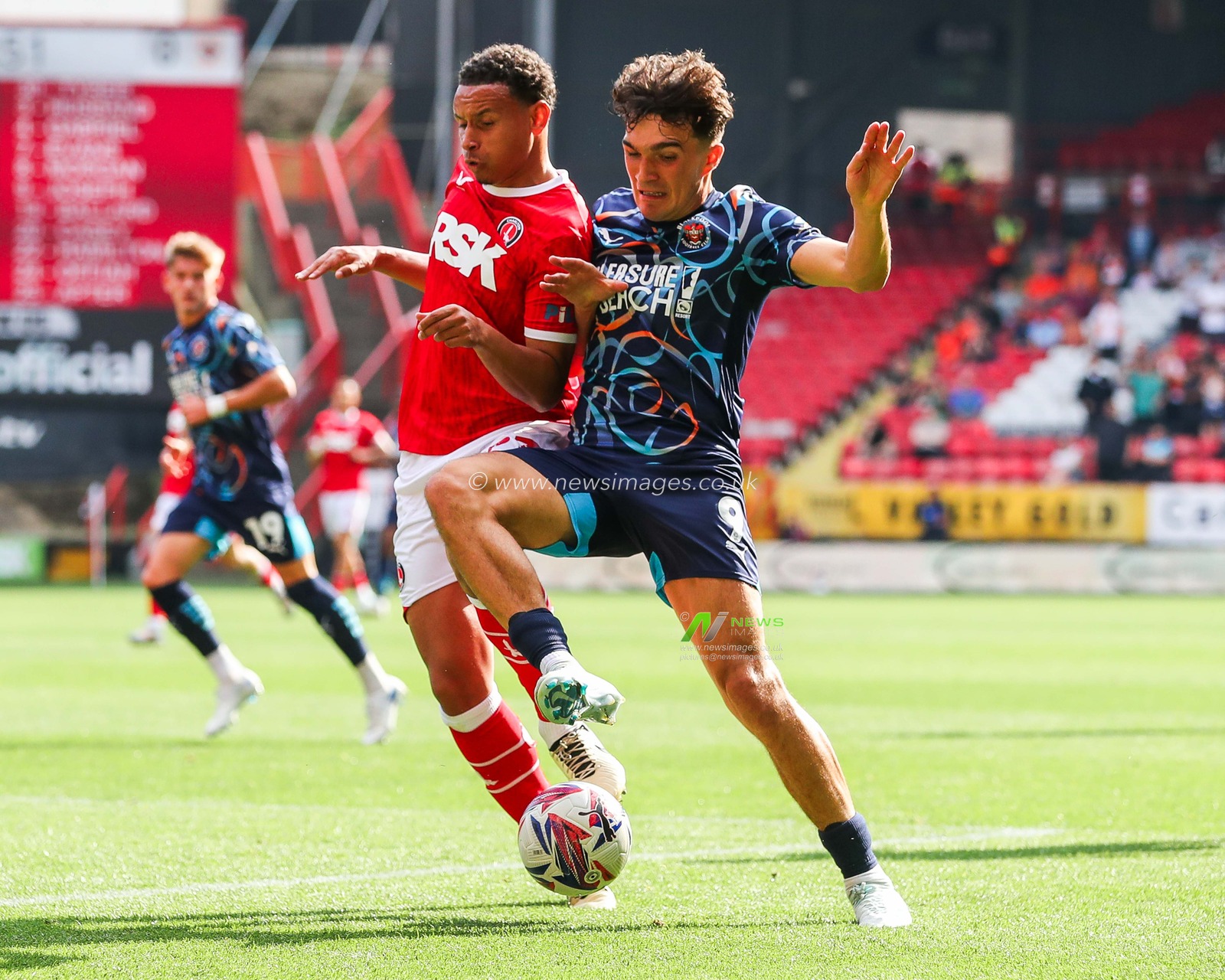 Rarmani Edmonds-Green of Charlton Athletic battles for the ball with Kyle Joseph of Blackpool during the Sky Bet League 1 match Charlton Athletic vs Blackpool at The Valley, London, United Kingdom, 21st September 2024

(Photo by Izzy Poles/News Images)
