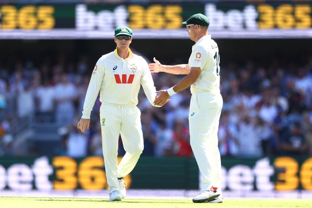 Steve Smith of Australia, left and Scott Boland of Australia are seen during the NRMA Insurance Ashes Second Test Day 2 Australia vs England at The Gabba, Brisbane Cricket Ground, Brisbane, Australia, 5th December 2025

(Photo by Pat Hoelscher/News Images)

*** GER AUT SUI OUT ***