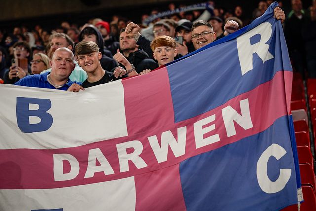 Blackburn fans celebrate their team victory during the Sky Bet Championship match Sheffield United vs Blackburn Rovers at Bramall Lane, Sheffield, United Kingdom on 22 April 2026

(Photo by Maynard Manyowa/News Images)