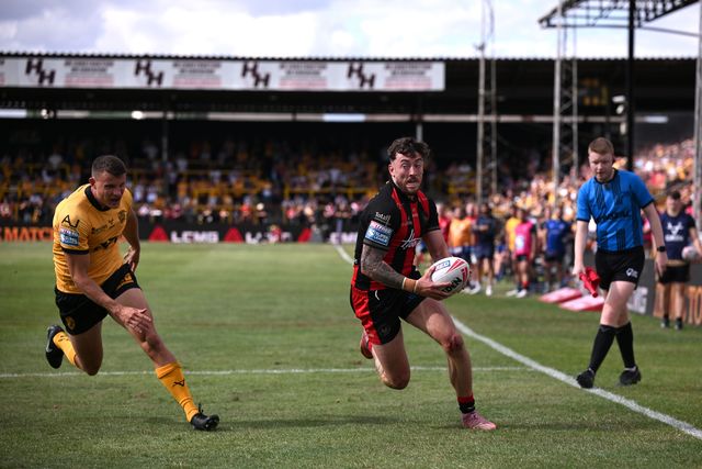 Toby King of Warrington Wolves makes a try during the Betfred Super League round 21 match Castleford Tigers vs Warrington Wolves at OneBore Stadium, Castleford, Untied Kingdom on 01 August 2026

(Photo by Ben Roberts/News Images)

