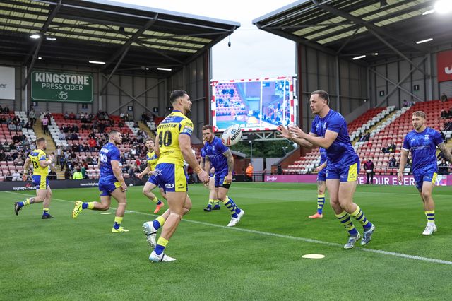 Ben Currie of Warrington Wolves and Ryan Matterson of Warrington Wolves in the pre-game warm up during the Betfred Super League Round 20 Leigh Leopards vs Warrington Wolves at Leigh Sports Village, Leigh, United Kingdom, 1st August 2025

(Photo by Mark Cosgrove/News Images)