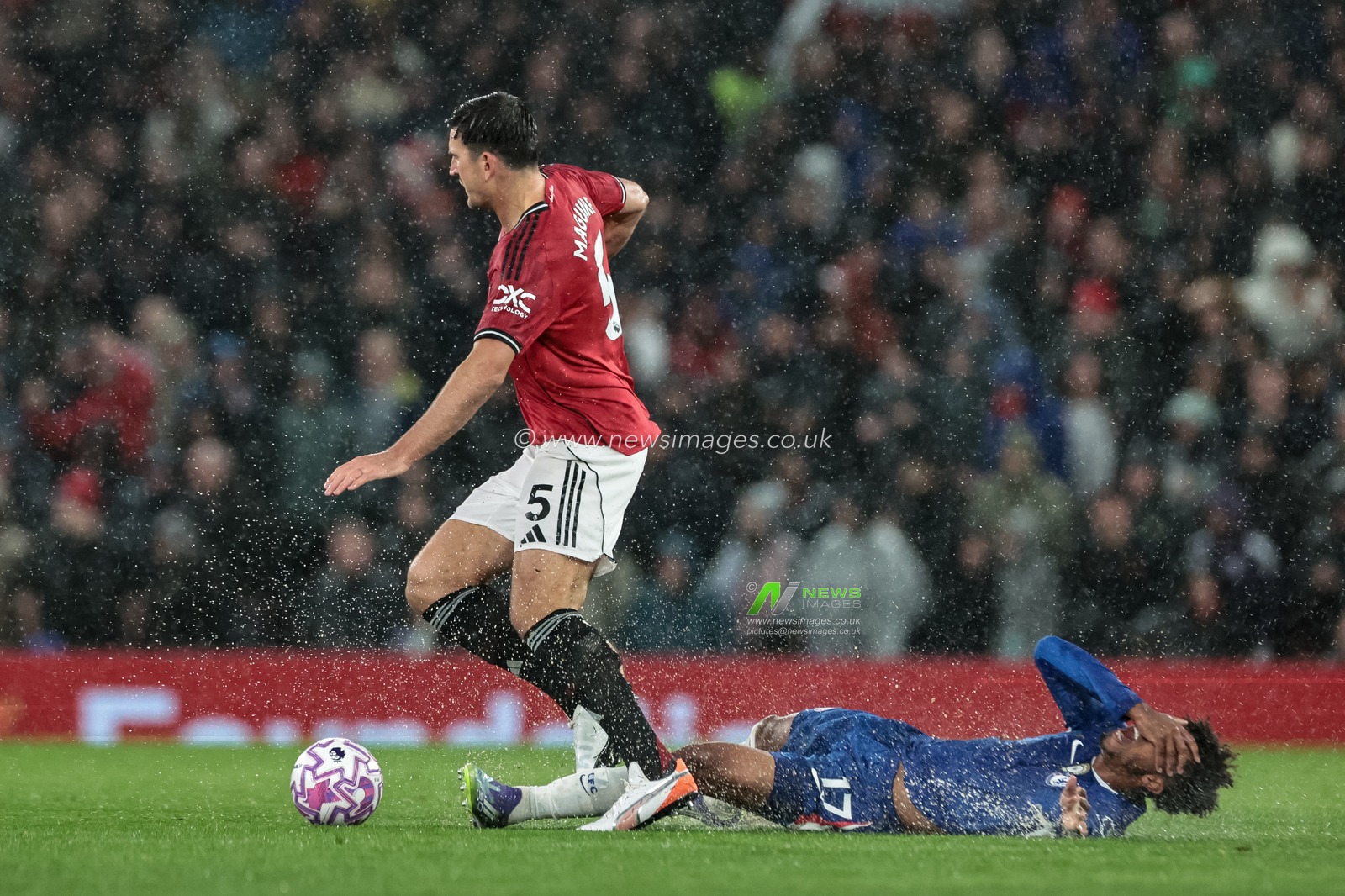 Andrey Santos of Chelsea is tackled by Harry Maguire of Manchester United during the Premier League match Manchester United vs Chelsea at Old Trafford, Manchester, United Kingdom, 20th September 2025

(Photo by Mark Cosgrove/News Images)