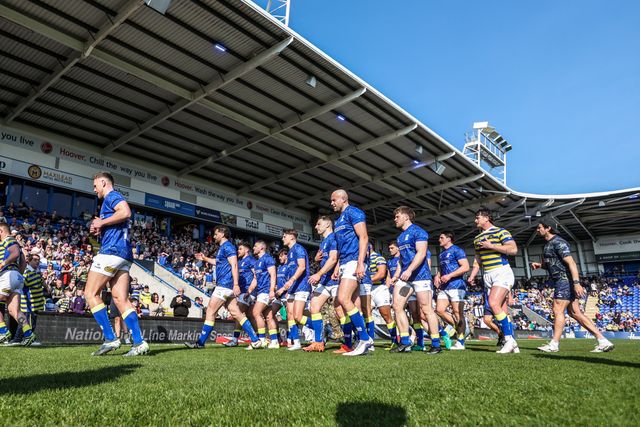 Warrington Wolves players head in after the warmups during the Betfred Super League round 5 match Warrington Wolves vs Castleford Tigers at The Halliwell Jones Stadium, Warrington, United Kingdom on 21 March 2026

(Photo by Alfie Cosgrove/News Images)