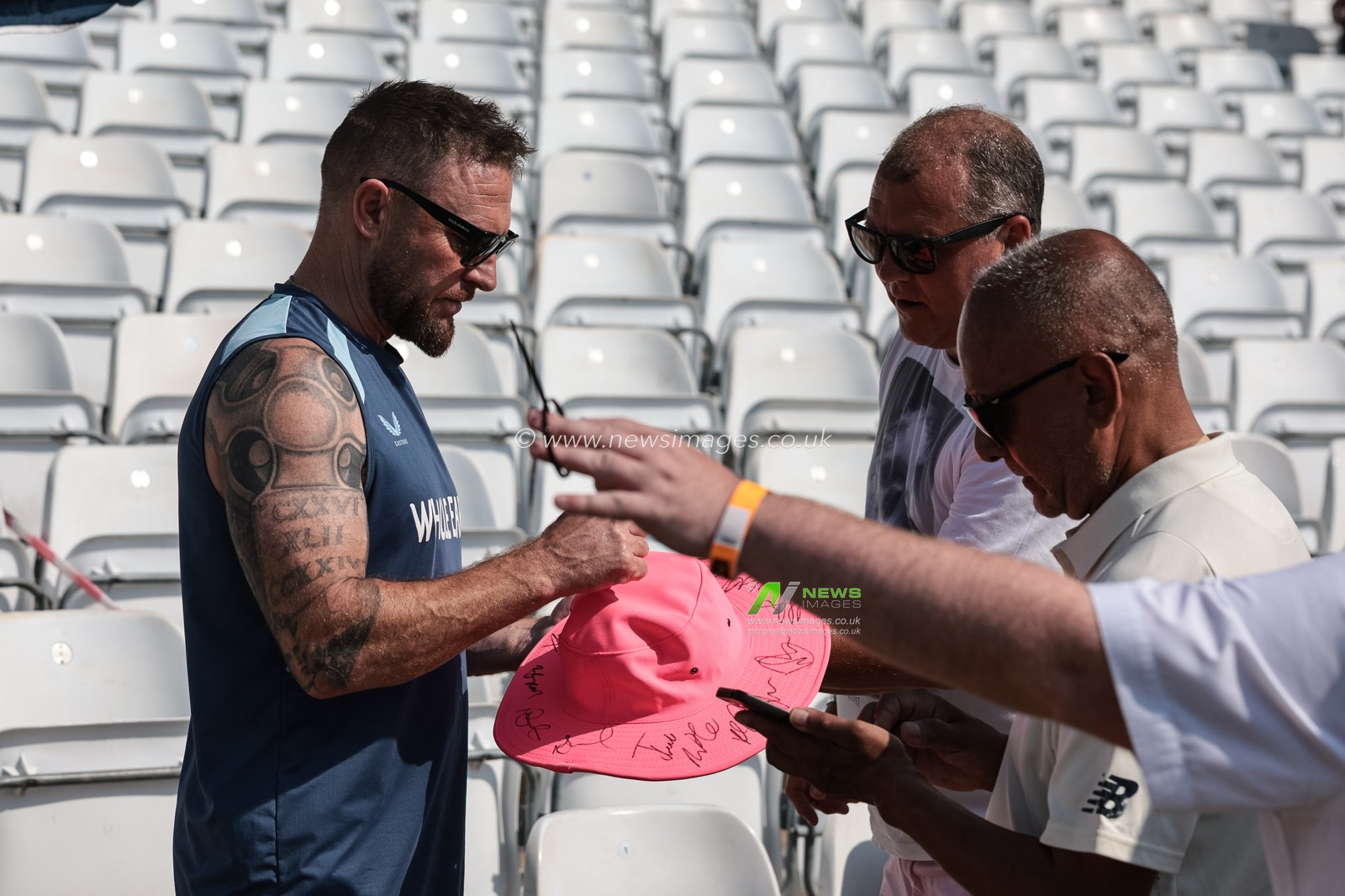 Brendon McCullum head coach of England signs a hat for a spectator during the 3rd Rothesay Test Match Day 2 match England vs New Zealand at Trent Bridge, Nottingham, United Kingdom on 26 June 2026

(Photo by Mark Cosgrove/News Images)