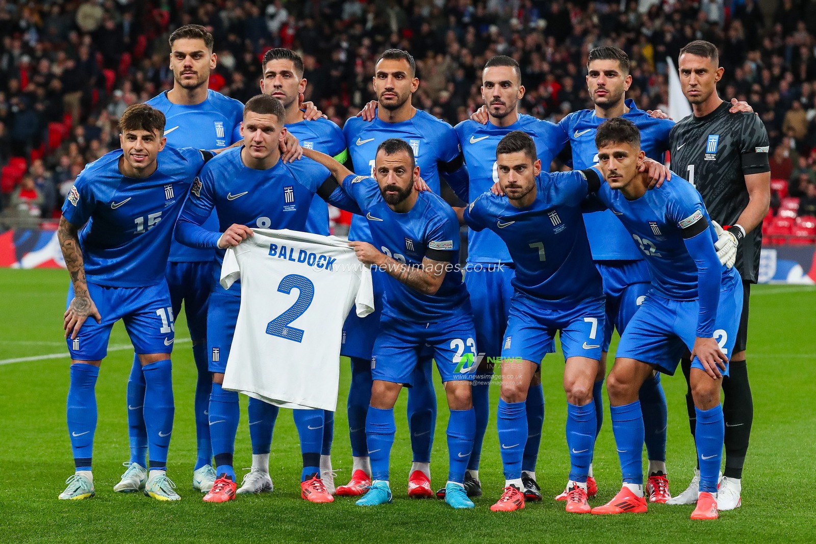 Greece players hold up George Baldocks shirt in remembrance during the UEFA Nations League - League B - Group B2 - match England vs Greece at Wembley Stadium, London, United Kingdom, 10th October 2024

(Photo by Gareth Evans/News Images)