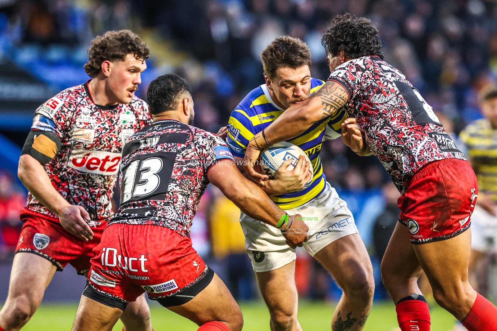 Liam Byrne of Warrington Wolves is tackled by Isaac Liu of Leigh Leopards during the Betfred Challenge Cup Quarter Final match Warrington Wolves vs Leigh Leopards at The Halliwell Jones Stadium, Warrington, United Kingdom on 11 April 2026

(Photo by Alfie Cosgrove/News Images)