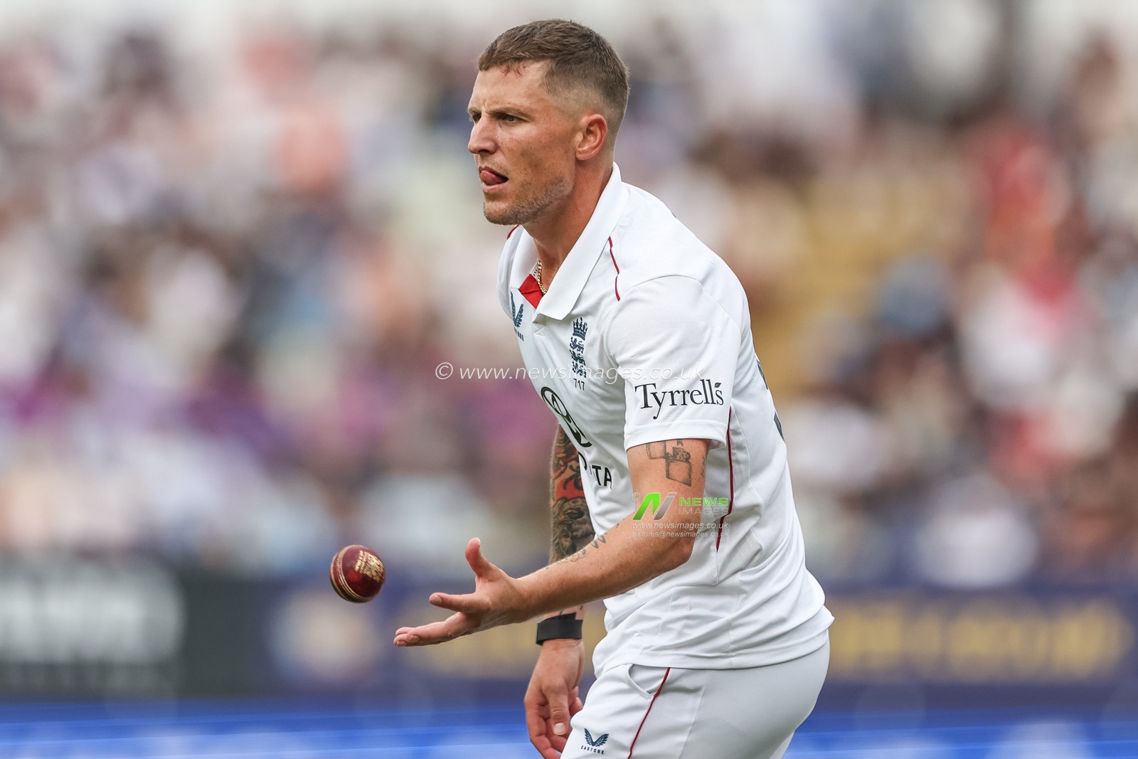 Brydon Carse of England receives the ball during the 2nd Rothesay Test Match day 3 England v India at Edgbaston, Birmingham, United Kingdom, 4th July 2025

(Photo by Mark Cosgrove/News Images)