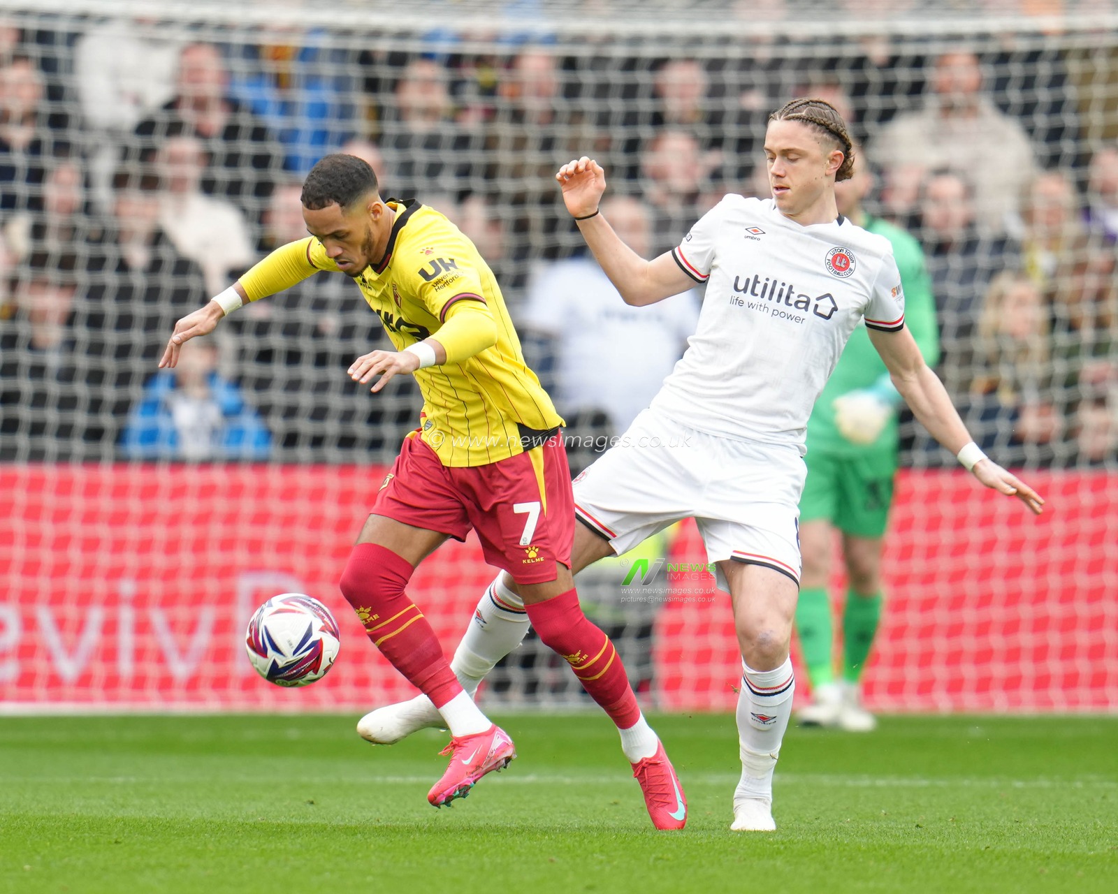 Thelo Aasgaard of Luton Town attempts to challenge Thomas Ince of Watford during the Sky Bet Championship match Watford vs Luton Town at Vicarage Road, Watford, United Kingdom, 23rd February 2025

(Photo by Harvey Murphy/News Images)