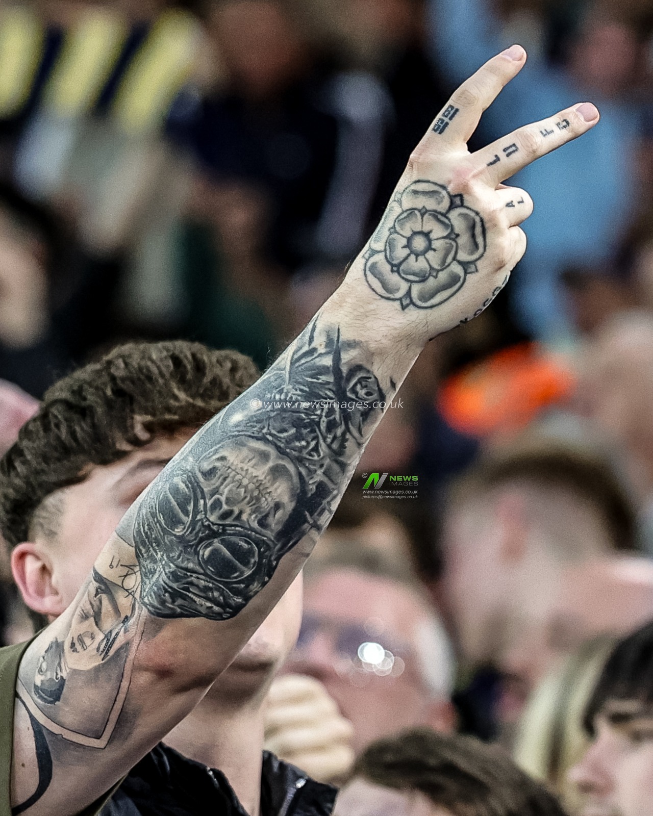 A Leeds United fan with LUFC and the Yorkshire rose tattoos on his hand during the Premier League match Leeds United vs Burnley at Elland Road, Leeds, United Kingdom on 01 May 2026

(Photo by Mark Cosgrove/News Images)