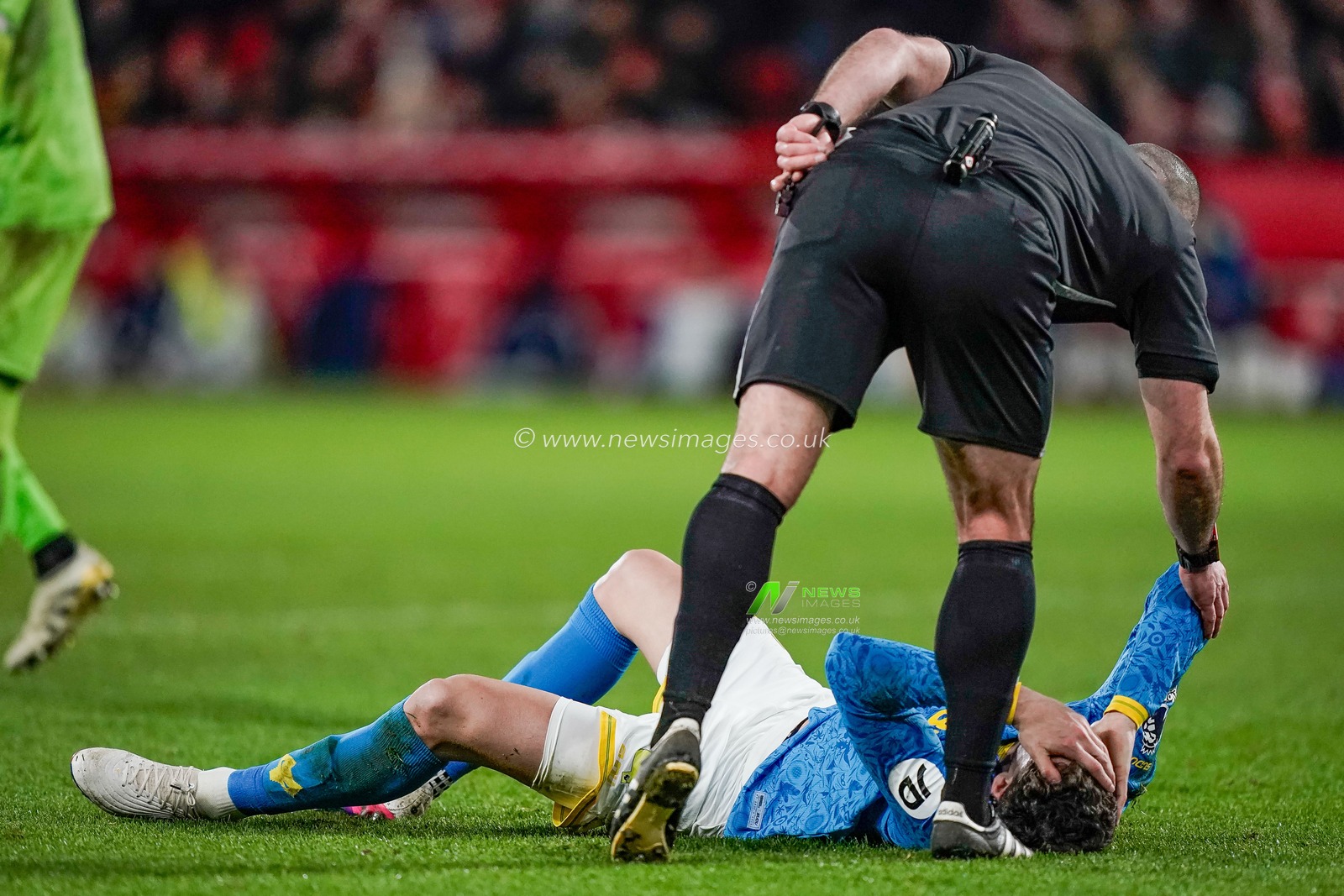 Referee Tim Robinson speaks to an injured player during the Premier League match Nottingham Forest vs Wolverhampton Wanderers at City Ground, Nottingham, United Kingdom on 11 February 2026

(Photo by Maynard Manyowa/News Images)